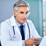 Home 4 비뇨기과 진료 중 가장 흔한 오해 - **Prompt: Preventive Urological Consultation**
A bright, clean, and modern doctor's office. A mi...